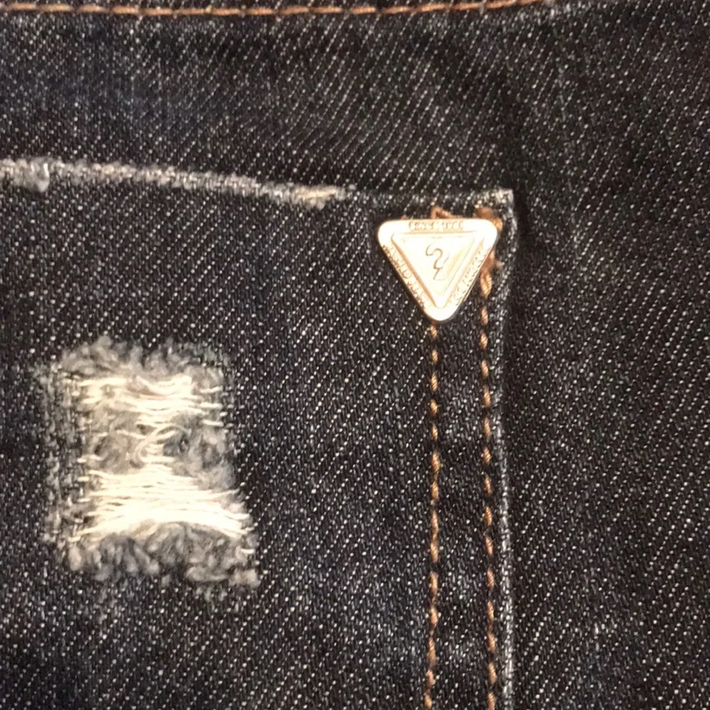 Guess denim mini skirt size 34.